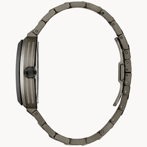 Close-up of a watch with a metallic band on a white background