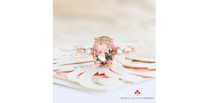 Rose gold ring with a pink gemstone on a white shell, Maple Leaf Diamonds logo visible.