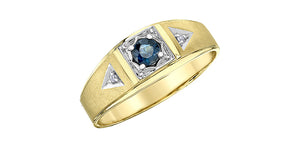 Gold ring with a blue gemstone and triangular designs on a white background