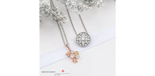 Load image into Gallery viewer, Silver necklace with a star pendant on a white background
