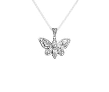 Load image into Gallery viewer, Silver butterfly pendant on a white background
