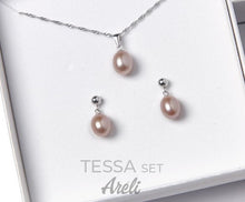 Load image into Gallery viewer, Pearl necklace and earrings set on a white background with &#39;TESSA SET Areli&#39; branding.
