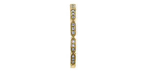 Gold earring with embedded diamonds on a white background