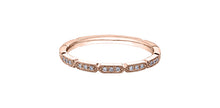 Load image into Gallery viewer, Rose gold ring with small diamonds on a white background
