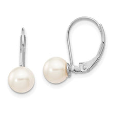 Load image into Gallery viewer, Pearl earrings with white gold hooks on a white background
