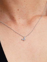 Load image into Gallery viewer, Silver butterfly necklace on a person&#39;s neck
