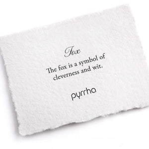 White card with text about the fox and brand name 'pyrrha' on a white background