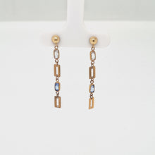 Load and play video in Gallery viewer, a spinning video of the earrings
