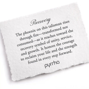 White card with engraved text about recovery and a phoenix symbol, branded 'pyrrha'.