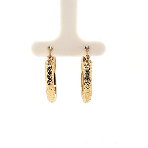 Diamond Cut Oval Hoops in Yellow Gold - Fifth Avenue Jewellers